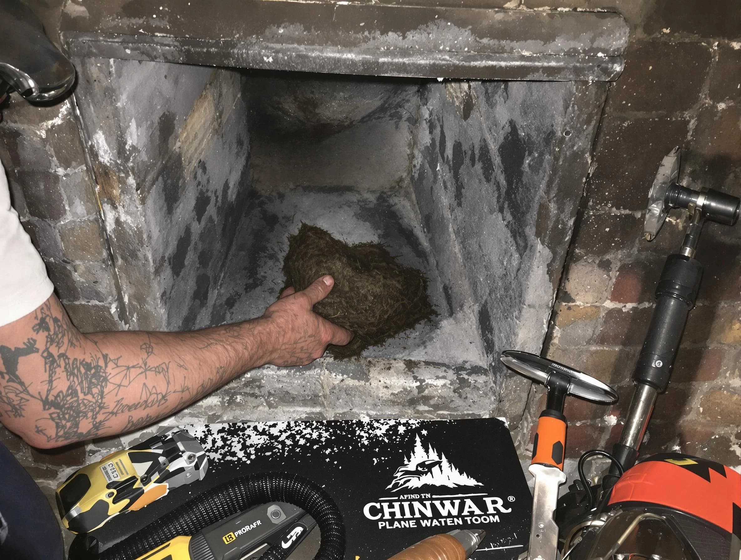 Tuttle Chimney Sweep safely removing debris and screening chimney in Tuttle, OK